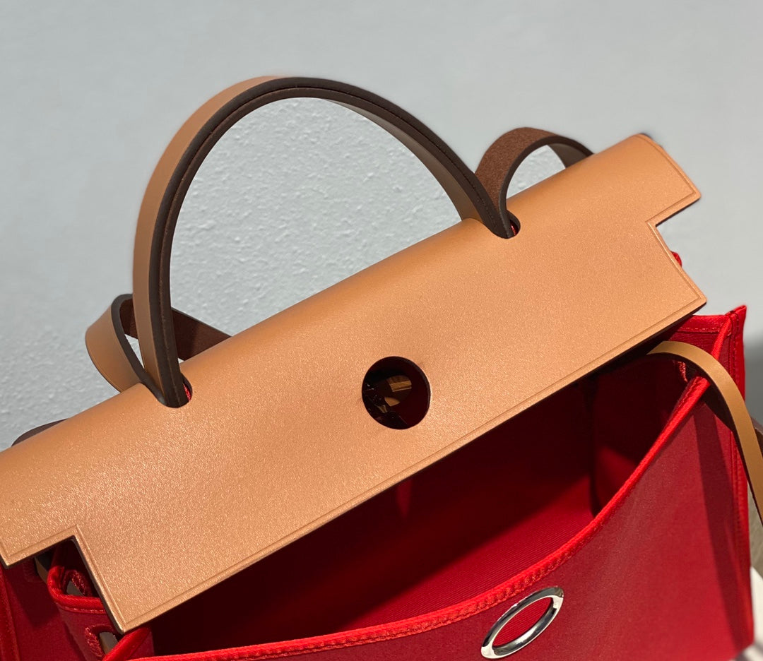 Herbag 31 Toile Lona Roja Piel de Vaca Dorada