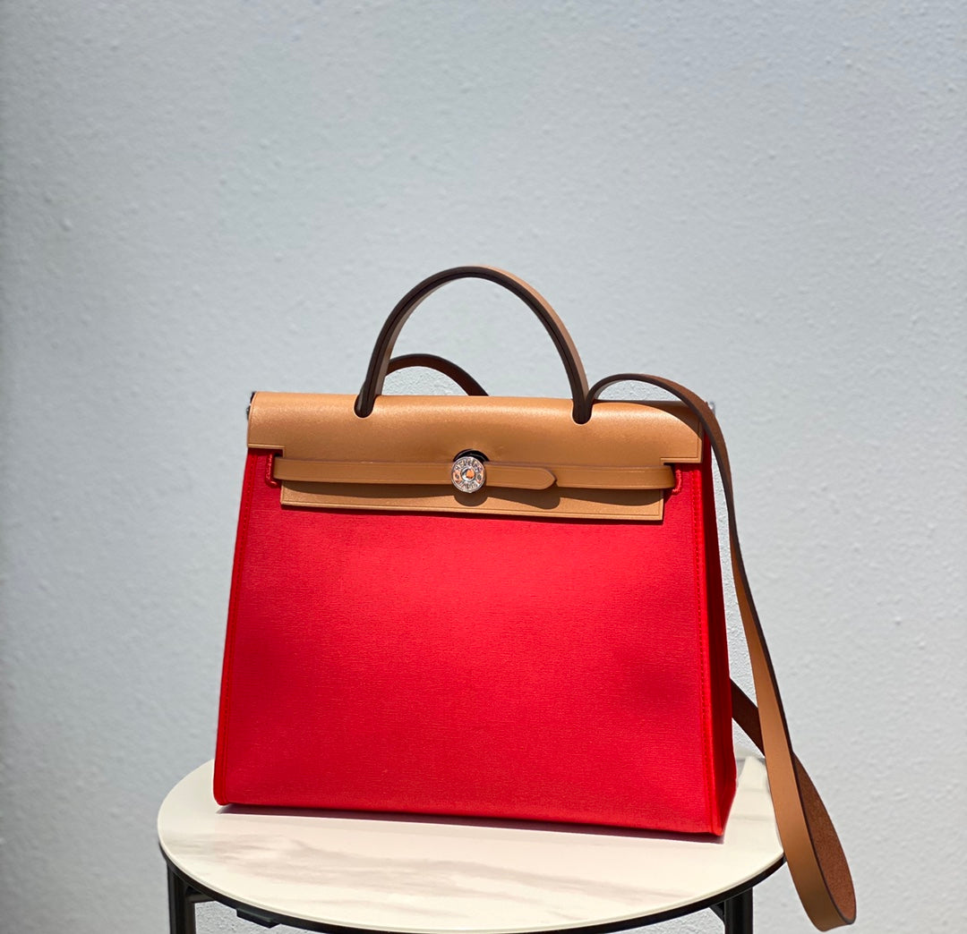 Herbag 31 Toile Lona Roja Piel de Vaca Dorada