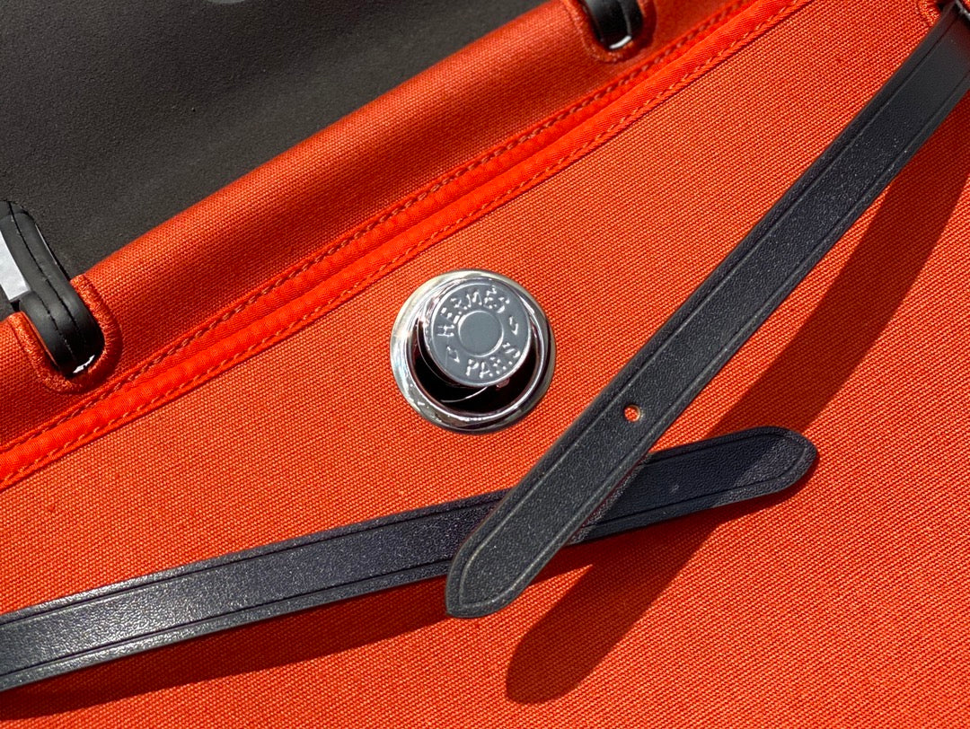 Herbag 31 Toile Lona Roja Naranja Piel de Vaca Negra