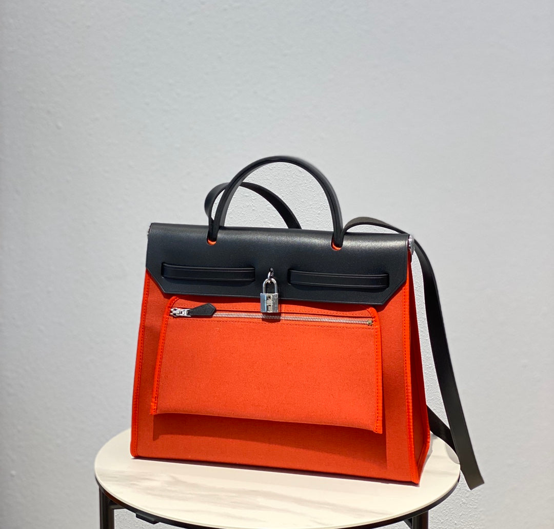 Herbag 31 Toile Lona Roja Naranja Piel de Vaca Negra