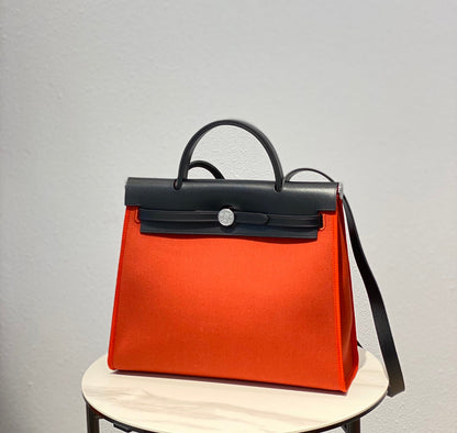Herbag 31 Toile Lona Roja Naranja Piel de Vaca Negra
