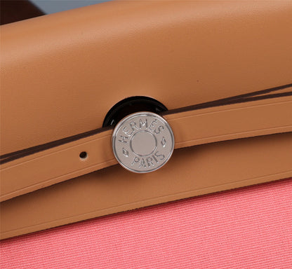 HM HERBAG ZIP 31 LONA CORAL Y COBRE