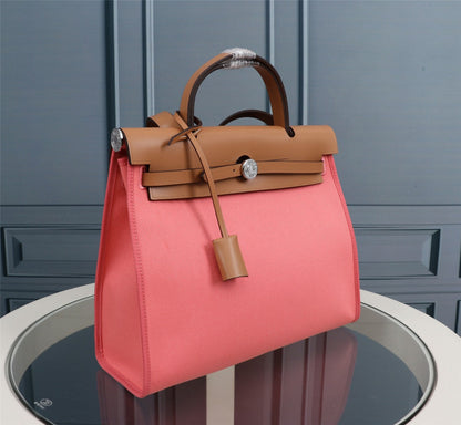 HM HERBAG ZIP 31 LONA CORAL Y COBRE