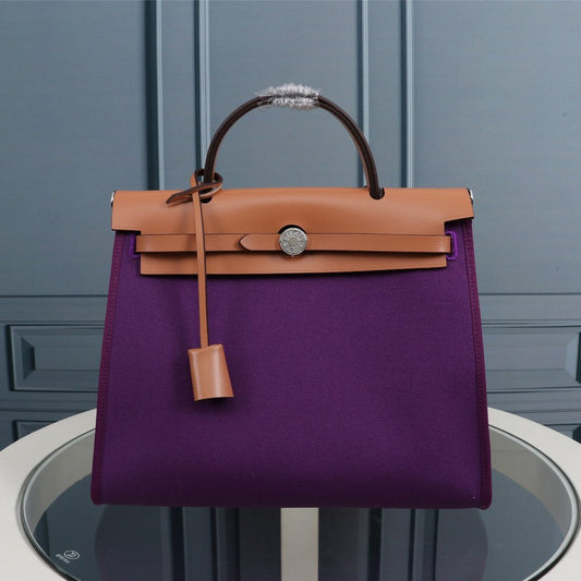 HM HERBAG ZIP 31 LONA VIOLETA Y COBRE