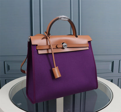 HM HERBAG ZIP 31 LONA VIOLETA Y COBRE