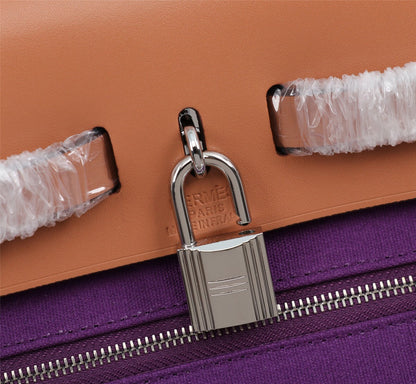 HM HERBAG ZIP 31 LONA VIOLETA Y COBRE