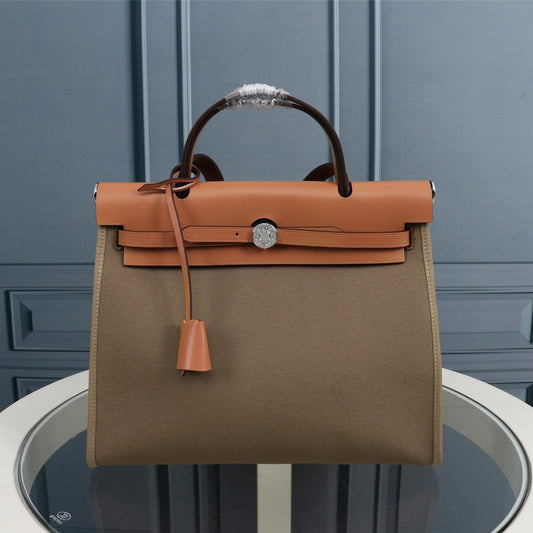 HM HERBAG ZIP 31 LONA OLIVA Y BRONCE