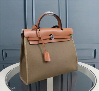 HM HERBAG ZIP 31 LONA OLIVA Y BRONCE