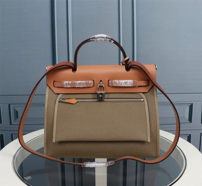 HM HERBAG ZIP 31 LONA OLIVA Y BRONCE