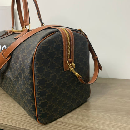 BOLSA DE VIAJE 50 EN LONA TRIOMPHE NEGRA CON ESTAMPADO DE PERRO
