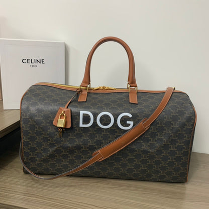 BOLSA DE VIAJE 50 EN LONA TRIOMPHE NEGRA CON ESTAMPADO DE PERRO
