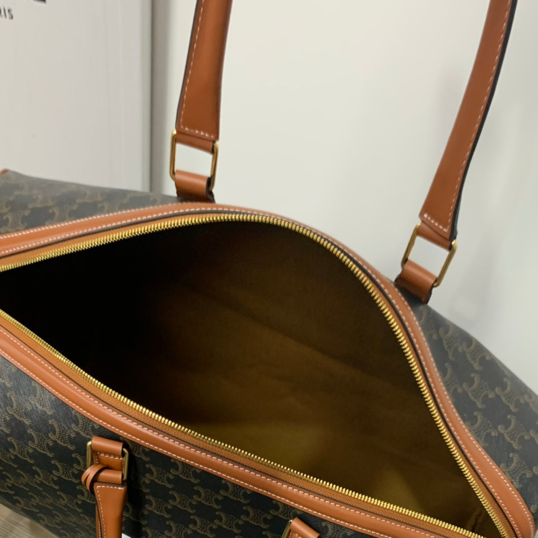 BOLSA DE VIAJE 50 EN LONA TRIOMPHE NEGRA CON ESTAMPADO DE PERRO