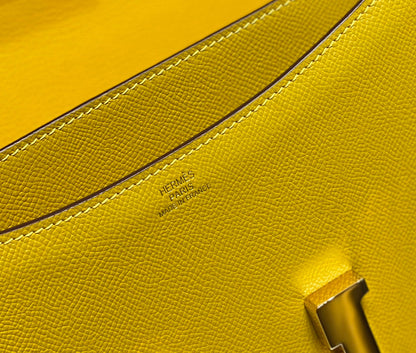 Constance 24, cuero Epsom amarillo, herrajes dorados