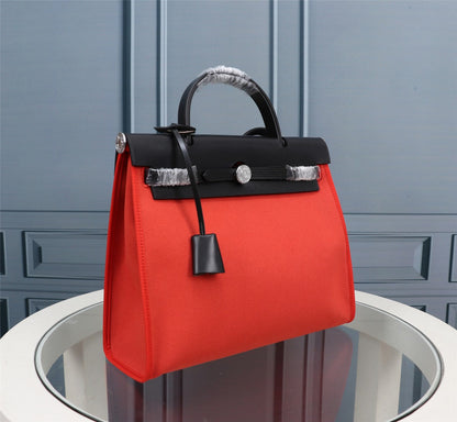 HM HERBAG ZIP 31 LONA NEGRA Y ROSA