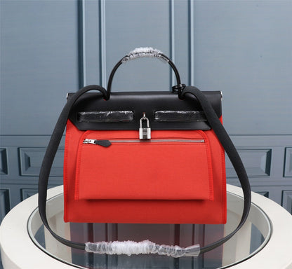 HM HERBAG ZIP 31 LONA NEGRA Y ROSA