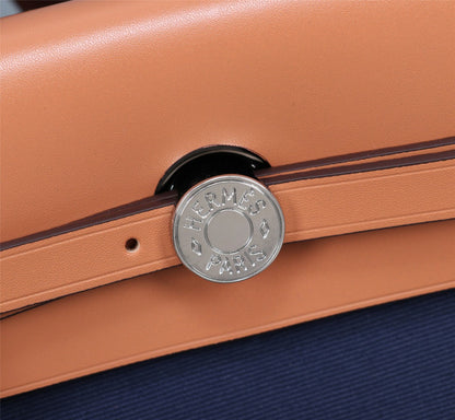 HM HERBAG ZIP 31 LONA AZUL MARINO Y BRONCE