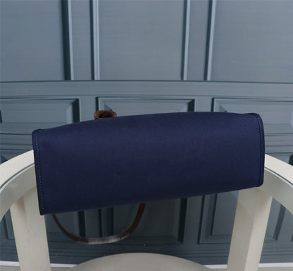 HM HERBAG ZIP 31 LONA AZUL MARINO Y BRONCE