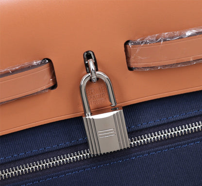HM HERBAG ZIP 31 LONA AZUL MARINO Y BRONCE