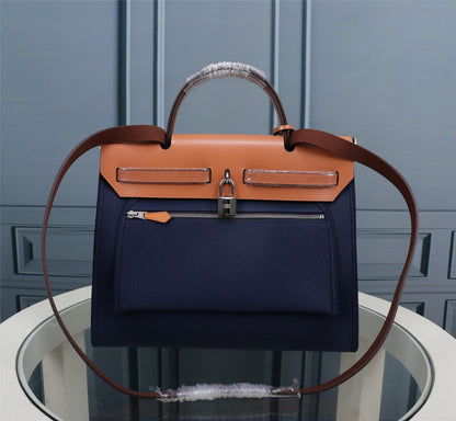 HM HERBAG ZIP 31 LONA AZUL MARINO Y BRONCE