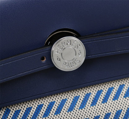 HM HERBAG ZIP 31 LONA CON MONOGRAMA AZUL MARINO Y CREMA