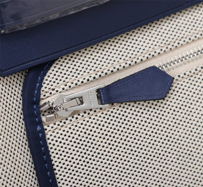 HM HERBAG ZIP 31 LONA CON MONOGRAMA AZUL MARINO Y CREMA
