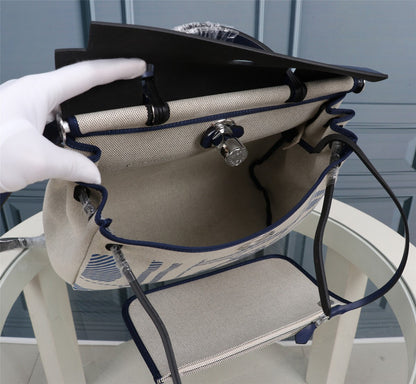 HM HERBAG ZIP 31 LONA CON MONOGRAMA AZUL MARINO Y CREMA