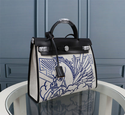 HM HERBAG ZIP 31 LONA CON MOTIVO DE CABALLO EN BLANCO Y NEGRO