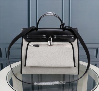 HM HERBAG ZIP 31 LONA CON MOTIVO DE CABALLO EN BLANCO Y NEGRO