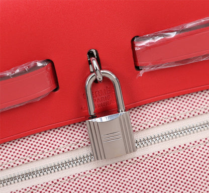 HM HERBAG ZIP 31 LONA CON MOTIVO DE CABALLO ROJO Y BLANCO