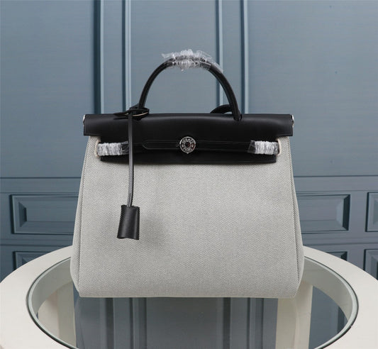 HM HERBAG ZIP 31 LONA BLANCA Y NEGRA