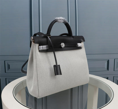 HM HERBAG ZIP 31 LONA BLANCA Y NEGRA