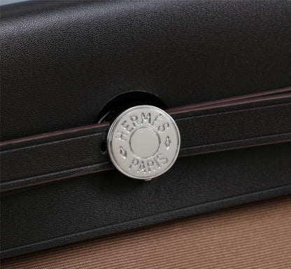 HM HERBAG ZIP 31 LONA NEGRA Y MARRÓN