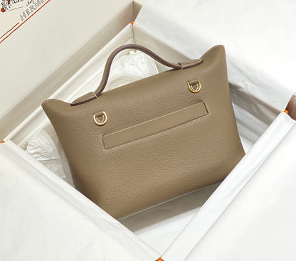 BOLSO DE MANO HM KELLY 29 PIEL DE BECERRO CAQUI