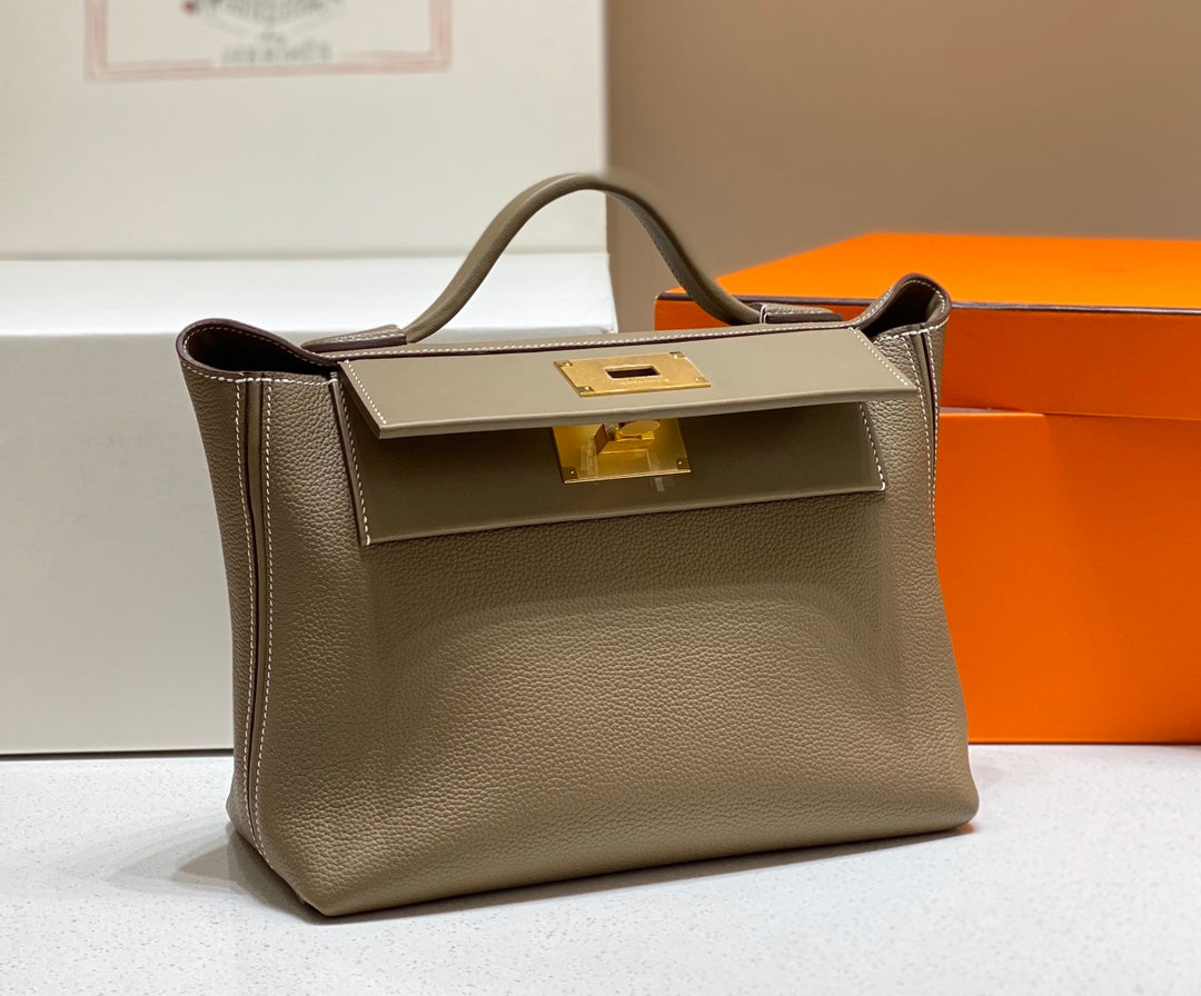 BOLSO DE MANO HM KELLY 29 PIEL DE BECERRO CAQUI