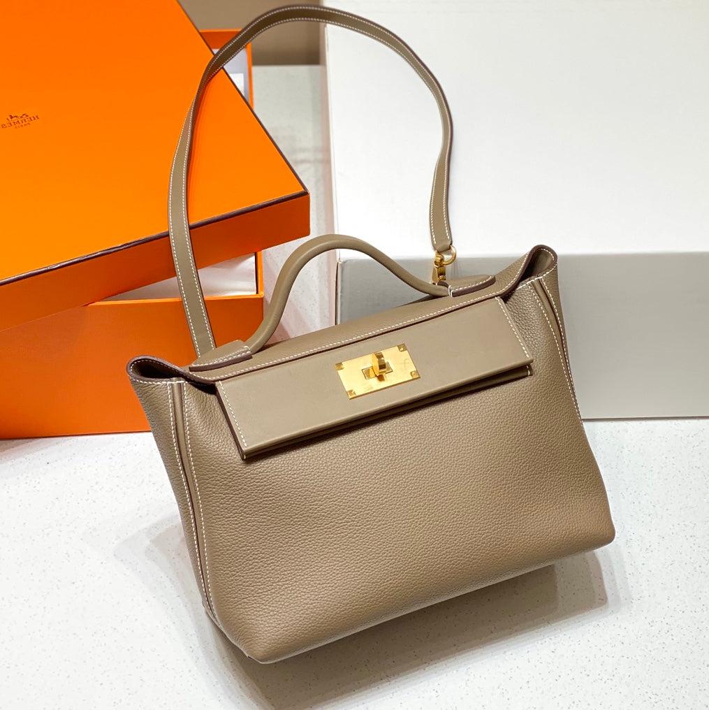 BOLSO DE MANO HM KELLY 29 PIEL DE BECERRO CAQUI