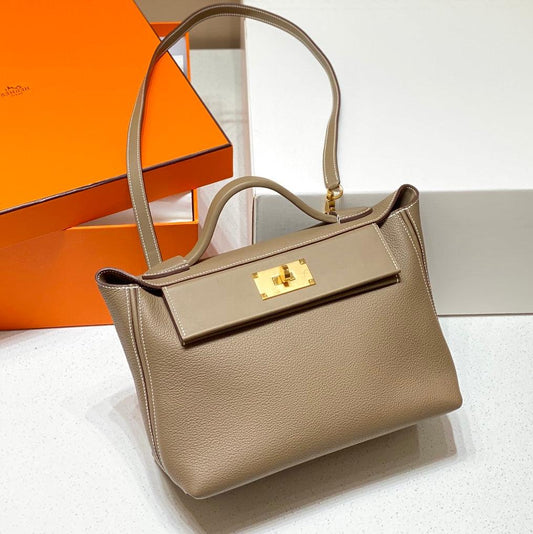 BOLSO DE MANO HM KELLY 29 PIEL DE BECERRO CAQUI