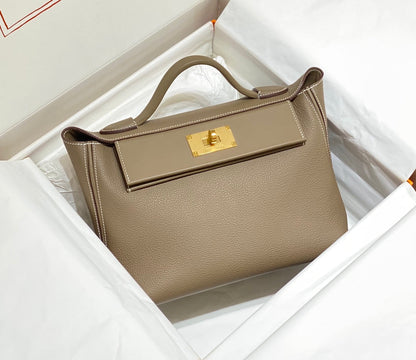 BOLSO DE MANO HM KELLY 29 PIEL DE BECERRO CAQUI