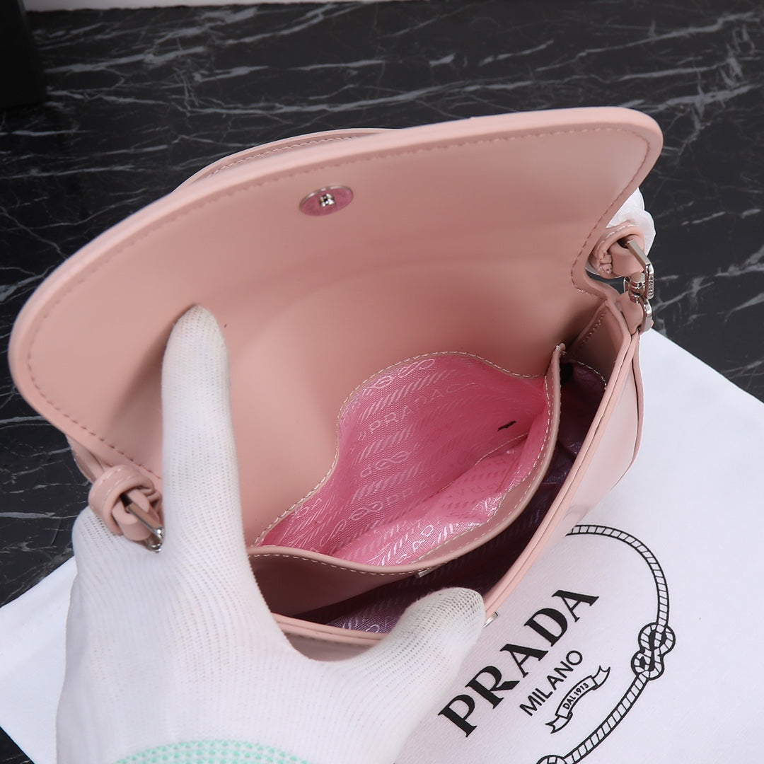 BOLSO PRA 23 DE PIEL DE BECERRO ROSA CLARO CON HERRAJES PLATEADOS