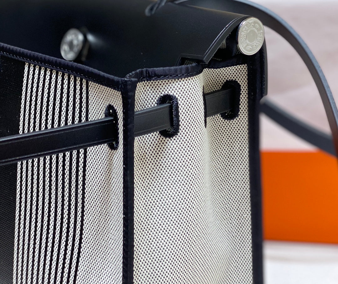 Herbag 31 Toile Lona Blanca Negra Piel de Vaca Negra