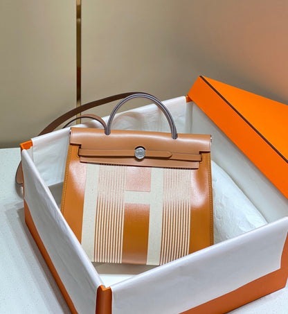Herbag 31 Toile Lona Oro Blanco Piel Vaca Dorada