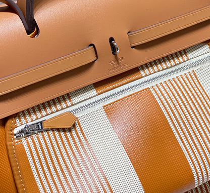 Herbag 31 Toile Lona Oro Blanco Piel Vaca Dorada