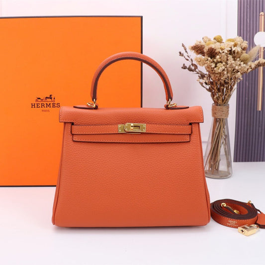 BOLSO HM KELLY 25 NARANJA TOGO HARDWARE DORADO