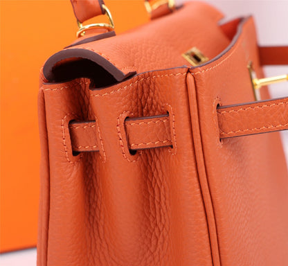 BOLSO HM KELLY 25 NARANJA TOGO HARDWARE DORADO