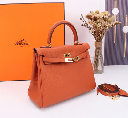 BOLSO HM KELLY 28 NARANJA TOGO HARDWARE DORADO