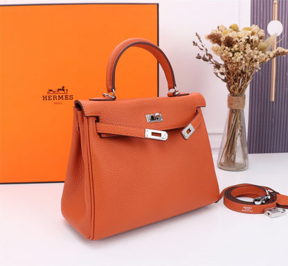 BOLSO HM KELLY 25 NARANJA TOGO HERRAMIENTAS PLATEADAS
