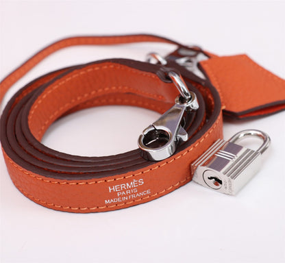 BOLSO HM KELLY 25 NARANJA TOGO HERRAMIENTAS PLATEADAS