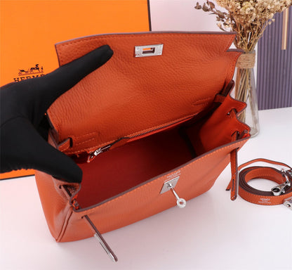 BOLSO HM KELLY 25 NARANJA TOGO HERRAMIENTAS PLATEADAS