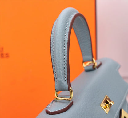 BOLSO HM KELLY 28 GRIS TEMPLADO TOGO HARDWARE DORADO