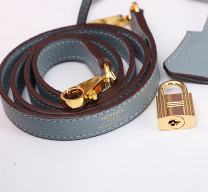 BOLSO HM KELLY 28 GRIS TEMPLADO TOGO HARDWARE DORADO
