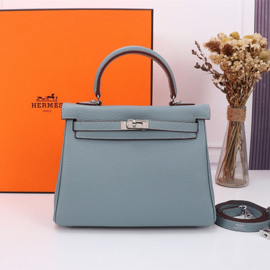 BOLSO HM KELLY 25 TOGO GRIS TEMPLADO CON HERRAJES DE PLATA